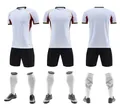 Detailed view of white breathable soccer kit with jersey, shorts, socks, and shoes. - 3XS / Top And Bottom / White