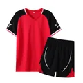 Detail view of red and black quick-dry men's soccer uniform set for training. - Red