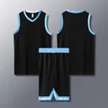 Detailed view of black basketball uniform set featuring light blue geometric pattern trim - Black