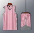 Detail of pink basketball jersey set featuring a sleeveless top and matching shorts. - Pink