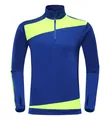 Nahaufnahme einer blau-neongelben langärmeligen Sportjacke mit halbem Reißverschluss. - 3XS / Oberteil (716) / Königsblau