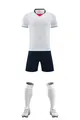 Full white and navy football kit set including jersey, shorts, socks, and soccer cleats. - White