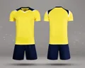 Front and back view of a yellow quick-dry soccer jersey and navy blue shorts set - Bright yellow