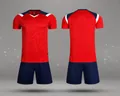 Detailed front and back view of a red quick-dry soccer jersey set with navy blue shorts. - 4XS / Top And Bottom / Red