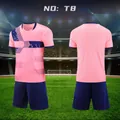 Detailed view showing the front and back of the pink and navy soccer training kit - 3XS / Top And Bottom / Pink/Blue (T8)