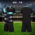 Detailed view showing the front and back of a black soccer jersey set with geometric patterns. - 3XS / Top And Bottom / Black