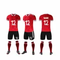 Full view of red and black football uniform set with jersey, shorts, and socks. - 22 / Top And Bottom / Red