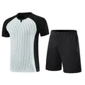 Professional basketball referee uniform set featuring a striped short-sleeved jersey and shorts. - S / Top And Bottom / Black & White Stripes