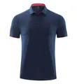 Polo à séchage rapide bleu foncé pour homme avec bordure rouge au col et aux manches - S / Hauts / Bleu marine