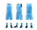 Detailed view of a light blue basketball uniform set with matching socks and shoes. - 3XS / Top And Bottom (639) / Light Blue