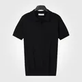 Polo homme noir en maille de coton à manches courtes avec col rabattu élégant - M / Haut (7005) / Noir