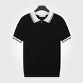 Men's slim-fit knit polo shirt in black with contrasting white collar and zipper detail. - M / Tops / Black