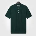 Polo à manches courtes en maille filet verte pour hommes, style chic et décontracté. - M / Hauts / Vert