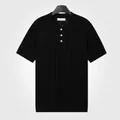 Polo noir en maille de soie glacée pour homme avec motif mesh et col classique. - M / Hauts / Noir