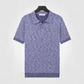 Vue détaillée d'un polo en maille respirant pour homme en bleu roi chiné texturé - M / Hauts / Bleu saphir