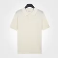 Polo en maille vintage blanc pour hommes à manches courtes avec finition texturée - M / Hauts / Blanc