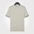 T-shirt en maille pour homme, coupe ajustée, couleur abricot, poignets rayés - M / Hauts / Abricot