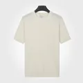 T-shirt en tricot pour hommes en soie glacée couleur abricot avec texture côtelée - M / Hauts / Abricot