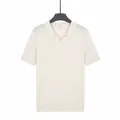 Polo en tricot de soie glacée pour hommes à manches courtes, couleur abricot élégant - M / Hauts / Abricot