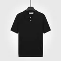 Polo en maille à manches courtes pour homme, coloris noir classique, tissu fin - M / Hauts / Noir