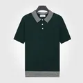 Polo en maille de soie glacée vert foncé pour hommes avec col rayé et style business casual - L / Hauts / Vert foncé