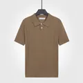 Polo en maille de soie glacée respirant pour hommes en couleur marron chameau - M / Hauts / Chameau