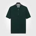 Polo en maille vert foncé pour homme avec col zippé et manches courtes élégantes - L / Hauts / Vert