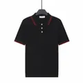 Polo en maille noire de qualité supérieure avec détails rouges et boutons blancs - M / Hauts / Noir