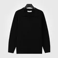 Polo en maille côtelée à manches longues pour homme dans une finition noire classique - M / Hauts / Noir