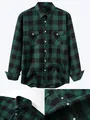 Detailed macro view of green and black checkered flannel shirt texture and buttons - Dark Green