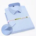 Detail view of light blue bamboo fiber short sleeve shirt with fabric texture closeup - 38 / Tops / Light Blue Oxford Texture