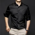 Camisa de lujo de satén de seda negra para hombre en un sofisticado estilo business casual - 3XL / Tops / Negro