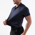 Close-up of men's navy short sleeve polo shirt showing high elasticity and silky fabric - Tops / Navy Blue