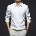 Premium white silk satin men's business dress shirt with a wrinkle-resistant finish. - White