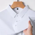 Premium white men's ice silk polo shirt featuring cooling breathable mesh fabric details. - 5XL / Tops / White