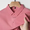 Close-up of pink men's ice silk polo shirt showing fabric texture - 5XL / Tops / Pink