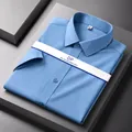 Professional light blue men's short-sleeve non-iron cotton dress shirt with no pocket design - Lake Blue