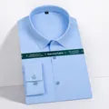 Camicia da uomo a maniche lunghe azzurro chiaro, tessuto antipiega per un look elegante - 38 / Top / Azzurro