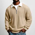 Detailed view of khaki waffle knit sweatshirt featuring a zip-up collar and ribbed cuffs. - Khaki
