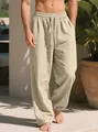 Detailansicht der lockeren beige Leinenhose für Herren mit Kordelzug am elastischen Bund - Khaki