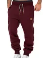 Close-up detail of men's burgundy drawstring jogger sweatpants with ribbed cuffs - S / Burgundy