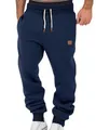 Detail einer dunkelblauen Herren-Jogginghose mit Kordelzug und Rippbündchen für Freizeit - Marineblau
