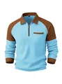 Detailed view of men's blue and brown waffle knit half-zip polo shirt with texture - S / Tops / Light Blue