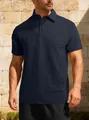 Detail shot of navy blue men's polo shirt featuring an intricate jacquard pattern. - Navy Blue