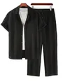 Detail view of black textured casual shirt and matching pants set on hangers - S / Top And Bottom / Black
