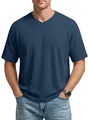 Detail shot of a men's blue waffle knit V-neck T-shirt showing texture and fit perfectly. - Navy Blue