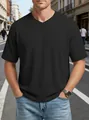 Detailed view of men's black waffle knit t-shirt featuring V-neck and raglan sleeve design - S / Black