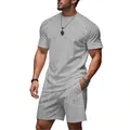 Completo sportivo grigio da uomo con t-shirt a maniche corte e pantaloncini - Taglia S / Top E Pantaloni / Grigio chiaro