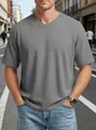 Close-up of men's grey V-neck T-shirt with waffle knit texture and raglan sleeves - Light Heather Gray