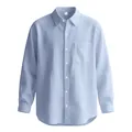Vue rapprochée d'une chemise en coton et lin bleu clair avec texture respirante. - Bleu clair